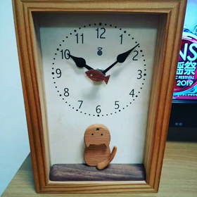 木の時計、見るたびほっこりの画像