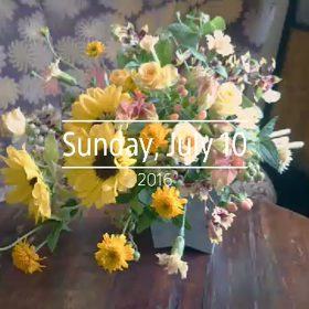 夏・ひまわりを使って花束風アレンジの画像