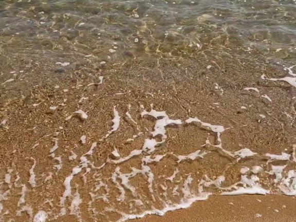 浜辺で波動調整の記事動画