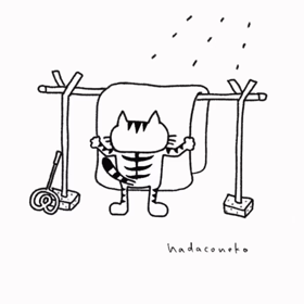 布団を干してる猫の画像