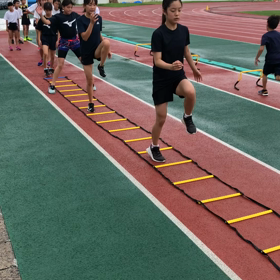 雨の中の練習の画像