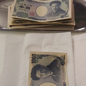 私がお札にアイロンをかける理由の画像