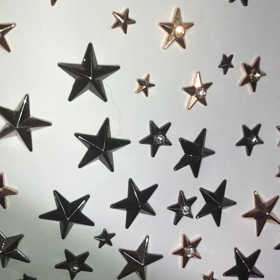 ラインストーン埋め込みスタースタッズ使用・星スタッズバッグ・Mサイズ・ホワイトの画像