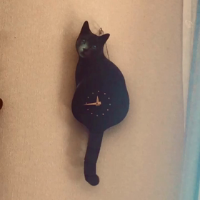 猫時計の画像