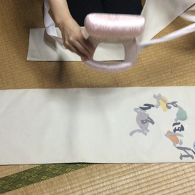 改良枕でお太鼓の画像