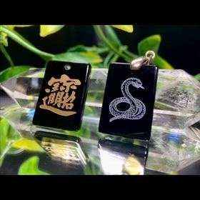 白蛇とオニキスのペンダントトップ✨の画像