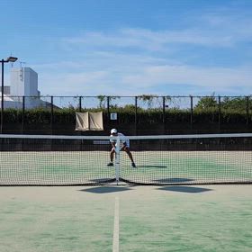 球出し練習とダブルス練習の画像