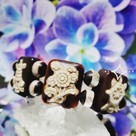 火供龍紋天珠・八吉祥ブレスレットの画像