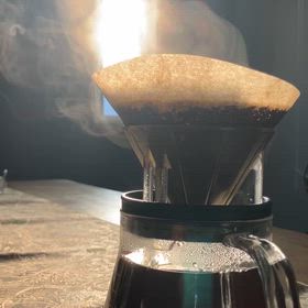 朝日と湯気の画像