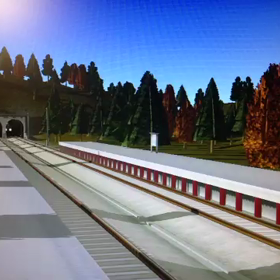 臨時駅を通過する719系の画像