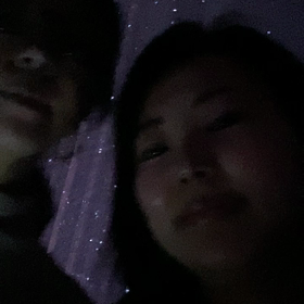 チームラボ豊洲にて。暗闇に光る頬。の画像