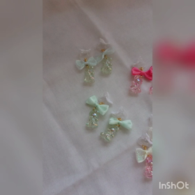 リボン×くまイヤリングの画像