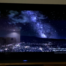 夫の膝の上での画像