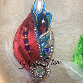 サテンプリーツブローチに羽を縫いつけて ＆メジロちゃんの画像