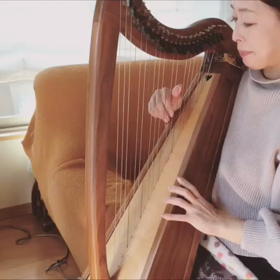 ハープ弾きと妖精の画像