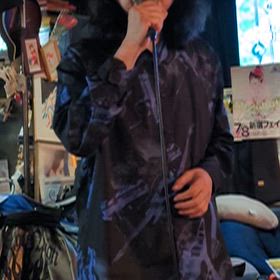 たまには歌う店主の画像