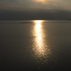 サロマ湖に輝く夕日ですの画像
